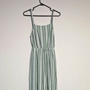 Thread story size lg cropped pantsuit open back tiesat bra line.